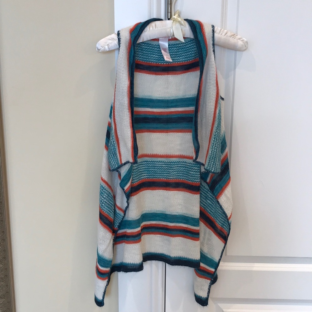 Kid’s/girl’s top in good condition fits size 13-14